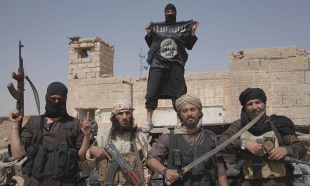 Islamic State Militants Patrol Syrian Border