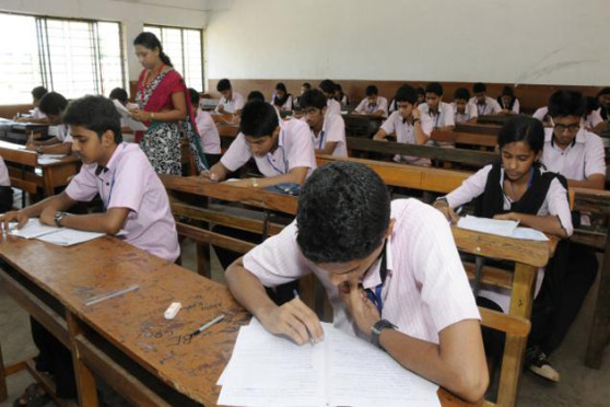 students giving Super 60 exam at S.N.P.M. High School Madhepura