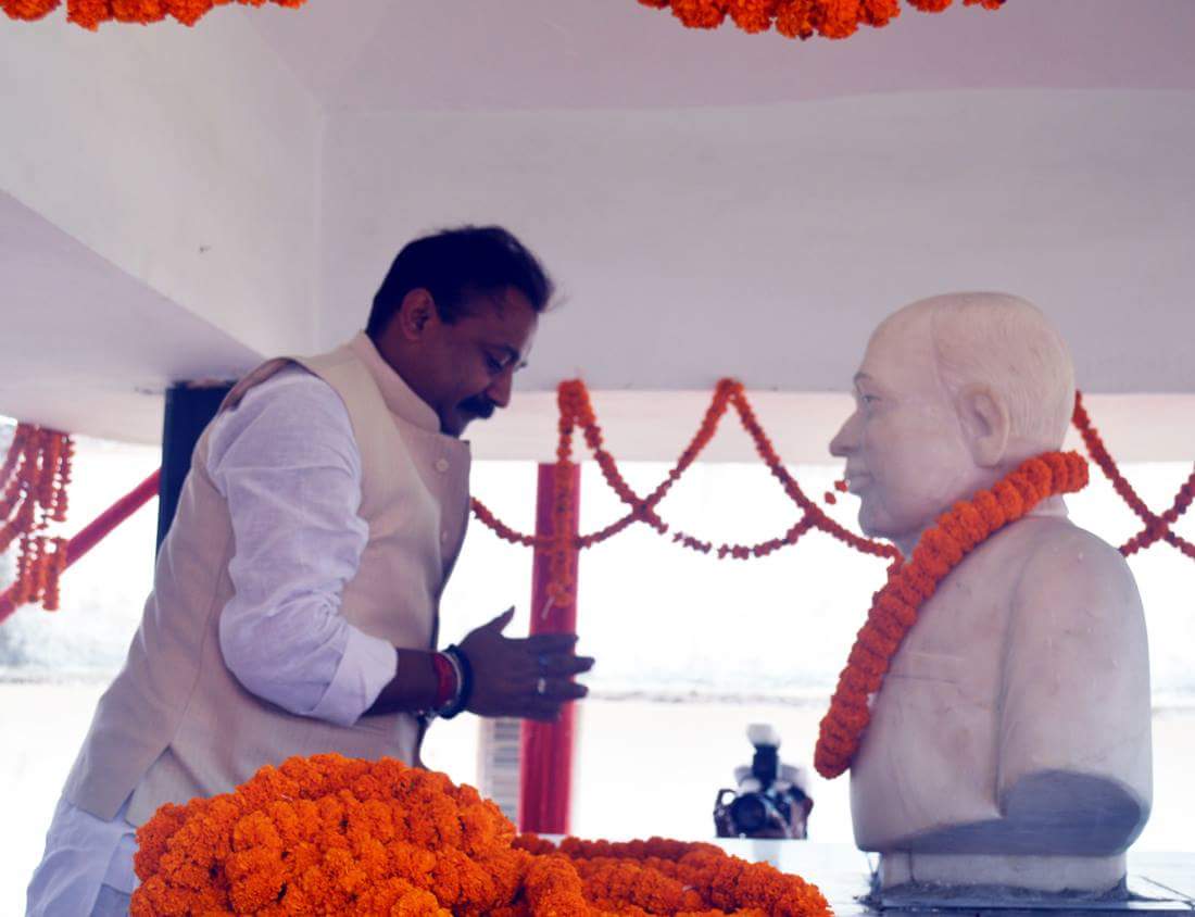 Education Minister Dr.Ashok Choudhary paying tribute to the statue of Great Samajwadi Bhupendra Narayan Mandal at B.N.Mandal University Campus Madhepura .