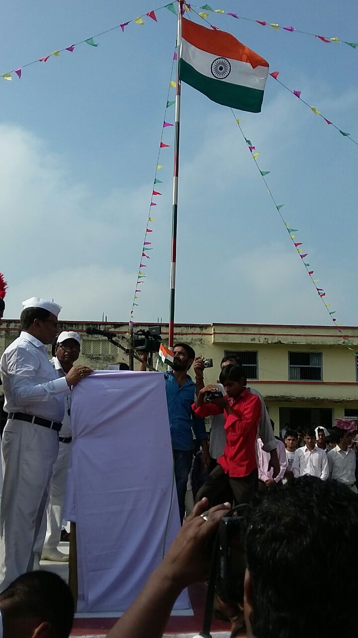 Principal Dr. H.L.S.Jauhari delivering speech after flag hoisting at T.P. College Madhepura campus .