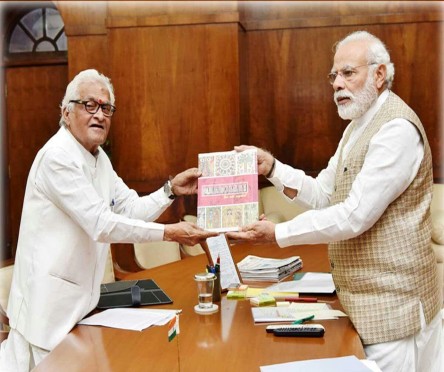 On the eve of Provincial Festival of Bihar Diwas, Ex-CM Dr.Jagannath Mishra presenting his book Madhubani : The Art Capital to Prime Minister Mr.Narendra Modi inside the Indian Parliament House .