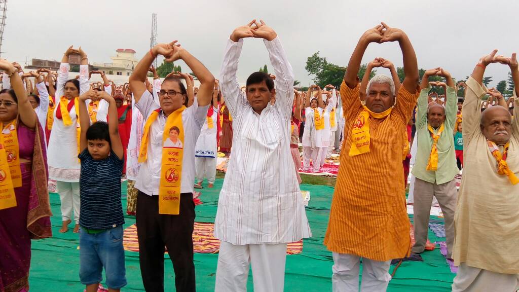 From L to R Zila Parishad Adhyaksha Smt.Manju Devi , Aditya , Dr.Bhupendra Madhepuri , Dr.Arun Kumar , Dr.Suresh Pd Yadav and Uttam Prasad Yadav etc attending 3rd International Yoga Shivir at BN Mandal Stadium Madhepura