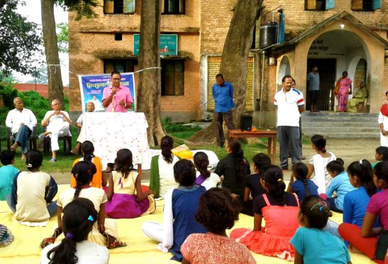 Samajsevi Dr.Bhupendra Madhepuri addressing the girls student of Kasturba Residential School after the inauguration of Yoga Session at Ward No-20, Madhepura.