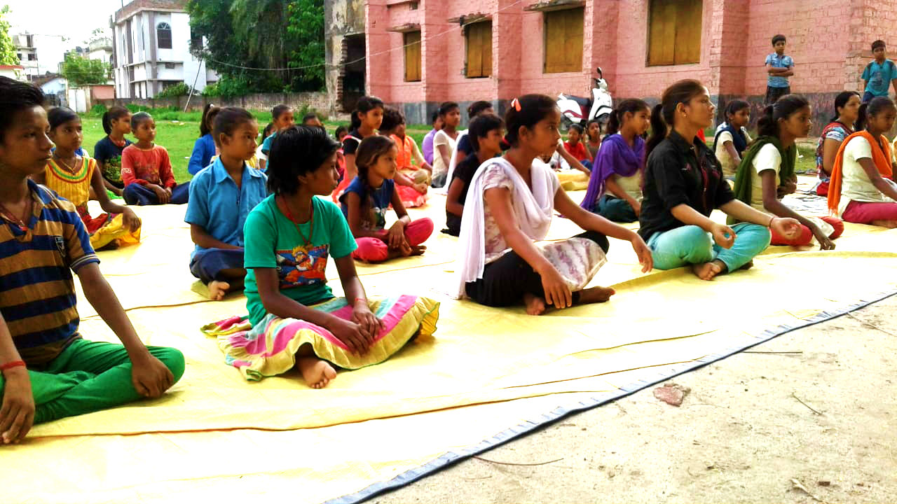 The Girls-students of Kasturba Residential School attending the first Yoga-Kaksha at School Campus.