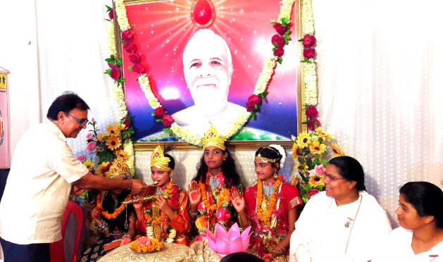 Chief Guest Dr.Bhupendra Narayan Yadav Madhepuri feeding 'Makhan' to Lord Krishna & others at Prajapita Ishwariya Vishwavidyalaya Branch Madhepura.