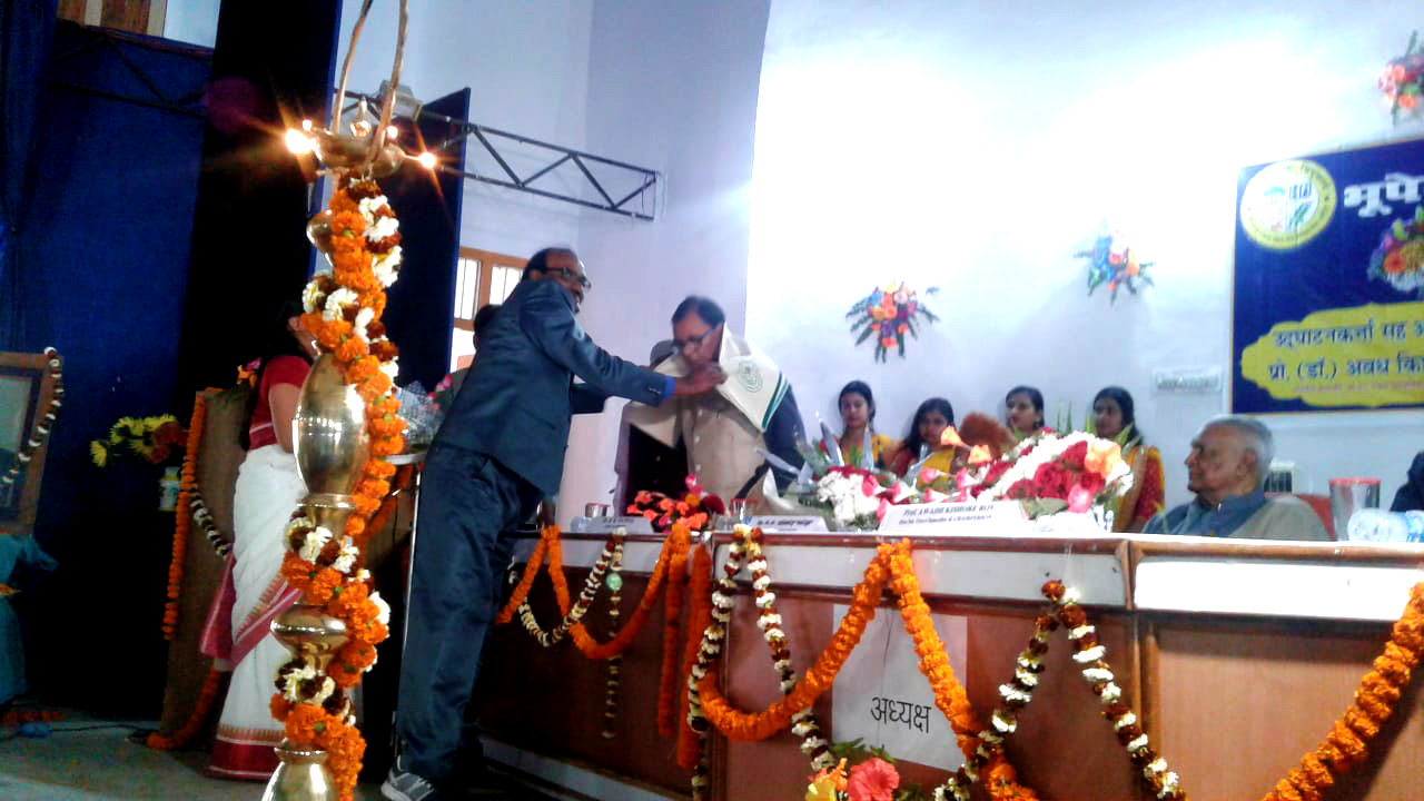 Dr.Bhupendra Madhepuri is being honoured at National Seminar, BNMU.