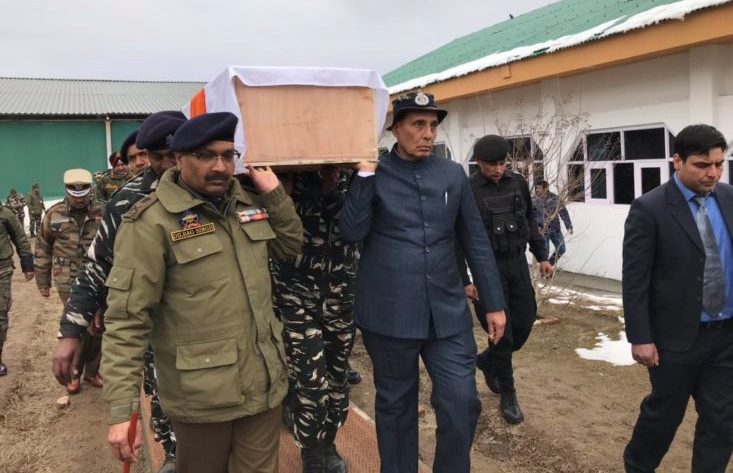 Home Minister Rajnath Singh carrying coffin of slain CRPF Soldier killed in Pulwama Attack.