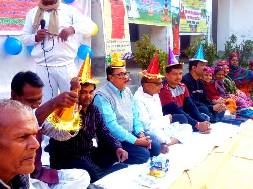 Dr.Bhupendra Madhepuri, Post Master Rajesh Kumar, Dr.N.K.Nirala, Dr.Anmol Ray and others attending Holi Milan Samaroh organised by Madhepura Patanjali Yoga Samiti at Rasbihari School Madhepura.