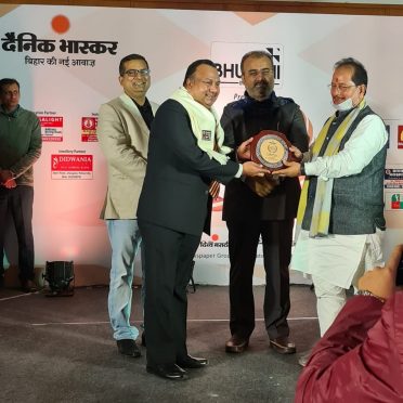 Dr.Manish Mandal in being honoured Doctor of pride award at Patna.