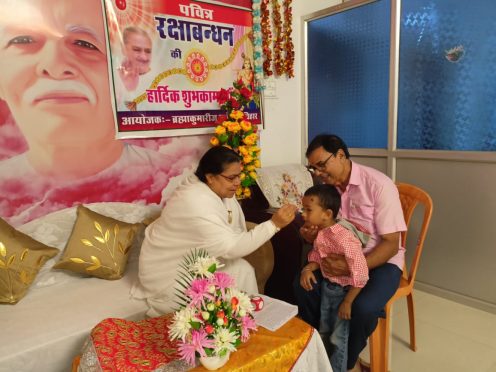 Brahma Kumari Ranju Didi celebrating Rakhabandhan with Dr.Bhupendra Madhepuri and his grandson Akshat (Nunu).